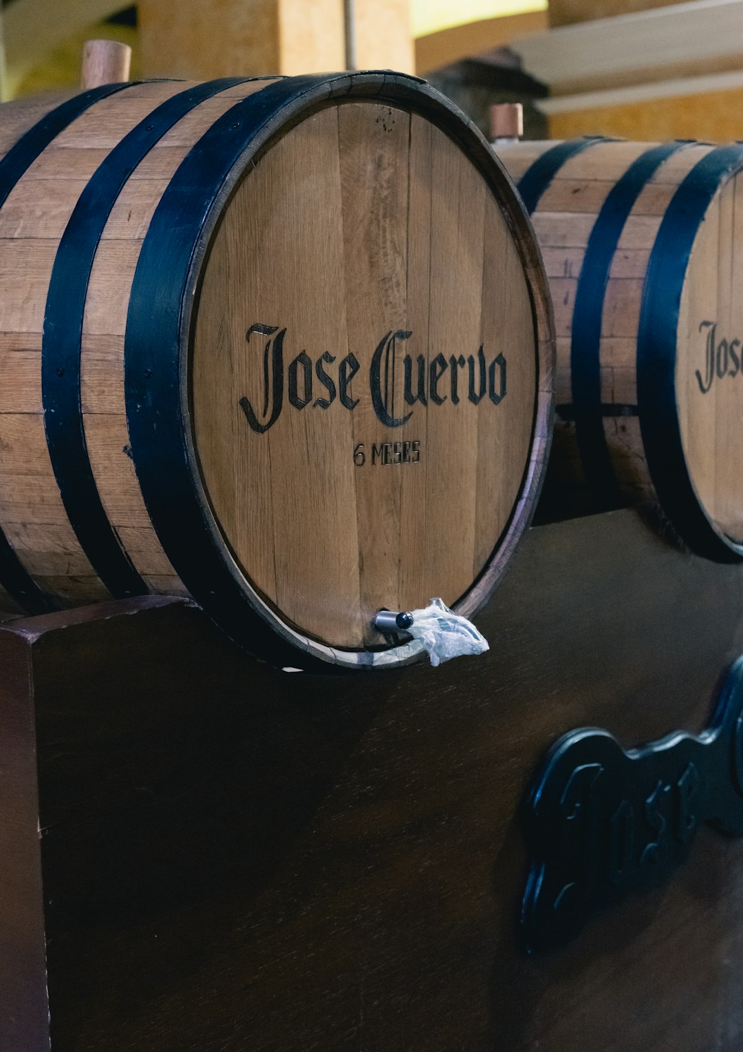 three-wooden-barrels-sitting-on-top-of-a-table-jaflgdsqnys